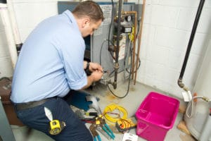 plumber providing furnace repair